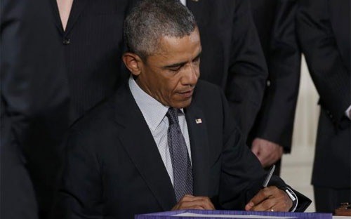 Президент США подписал закон о полномочиях по содействию торговле  - ảnh 1